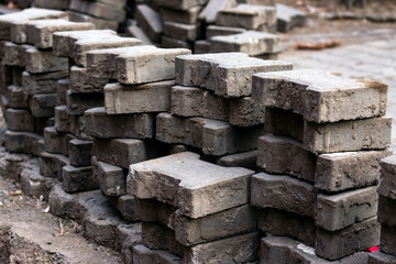 Paving stones. Scattered paving bricks.