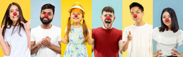 Collage of happy young people as a clowns celebrating red nose day. Male and female models on bicolored blue-yellow studio background. Celebrating, greeting, holidays concept. Human facial emotions. - obrazy, fototapety, plakaty