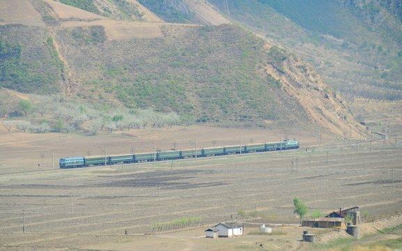 A passenger train from Tumangang to Pyongyang passes Namyang.