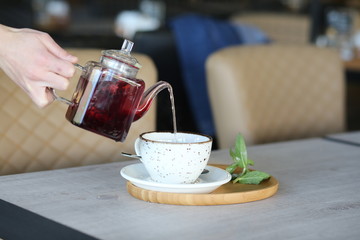 cheese cake next to herbal tea