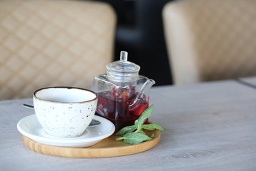 cheese cake next to herbal tea