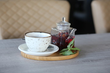 cheese cake next to herbal tea