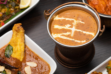 Traditional indian curry in dark background