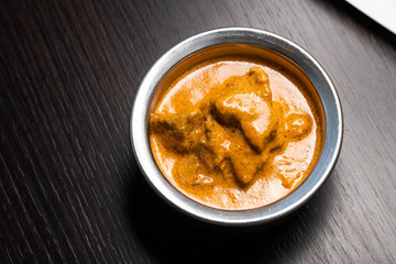 Traditional indian curry in dark background