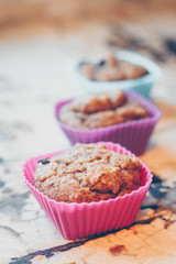 Healthy muffins in colored silicon cups