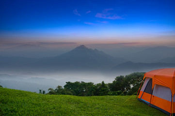 Camping tent in a beautiful place on the mountain - 322996589