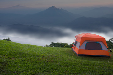 Camping tent in a beautiful place on the mountain - 322996594