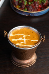Traditional indian curry in dark background