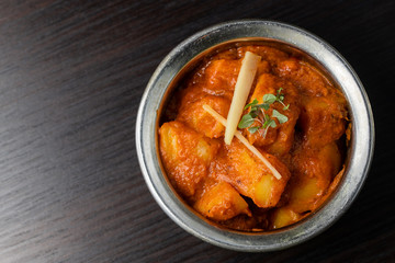 Traditional indian curry in dark background