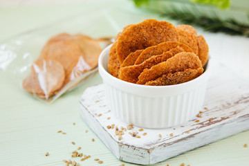 natural diet vegetarian chips on a light green background