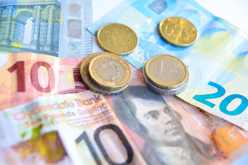 Euro and Pound banknotes and coins