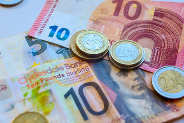 Euro and Pound banknotes and coins