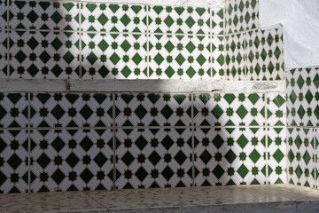 Typical moorish / andalusian tile pattern on stairs going up to a house entrance; Spain, Europe