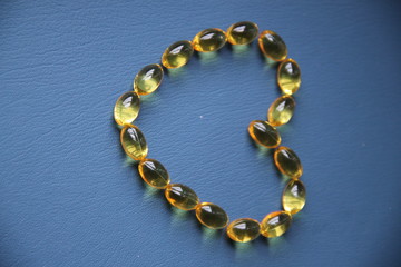 Omega 3 oil oval capsule medicine heart