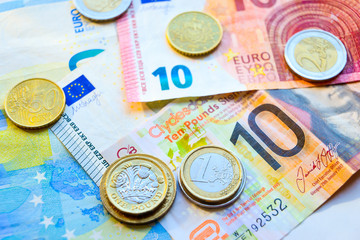 Euro and Pound banknotes and coins