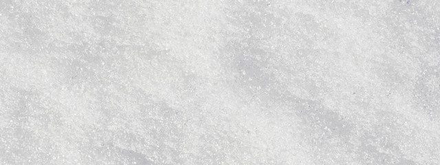 White snow surface background - top view of fresh snow texture on the ground