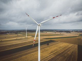 Aerial view of windmill against cloudy sky