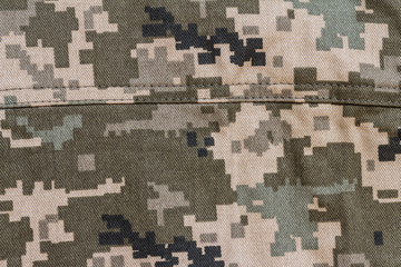 Closeup of military uniform surface.