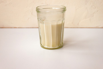 Glass of milk or cream diary drink. Cow, soy, oat, coconut or almond beverage on white background