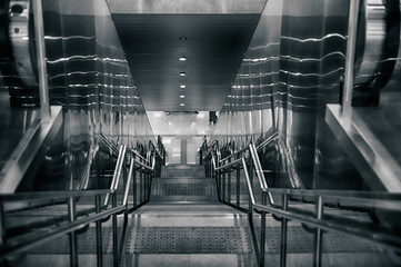 Stairway in metallic metro hall.