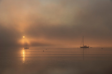Fototapeta na wymiar Boats in Sunrise