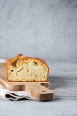 Banana sweet bread sliced on  wooden cutting board. Healthy Diet Breakfast Concept