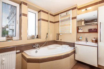 modern bathroom in the apartment. A glass shower door.