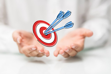 Dart arrow on target dartboard, Business success concept..