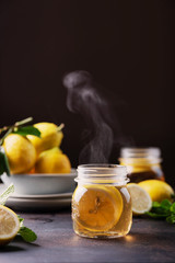Fototapeta na wymiar Hot lemon tea with mint