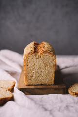 Fresh onion bread on the tablecloth. Close up view