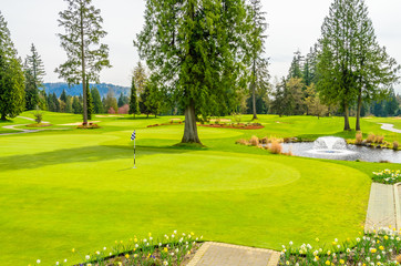 Golf flag at the beautiful golf course.