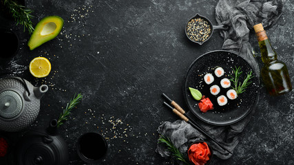 Sushi maki with salmon. Pieces of delicious sushi. Japanese cuisine © Yaruniv-Studio