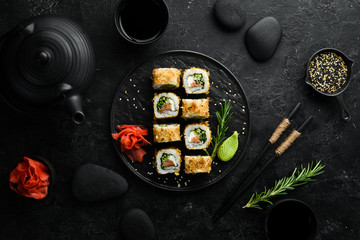 Sushi Bonito with salmon, cheese and tuna chips. Traditional Japanese sushi rolls © Yaruniv-Studio