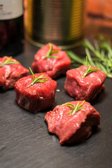 raw pork meat with rosemary
