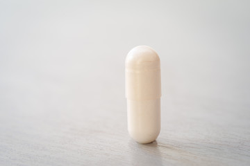 Magnesium citrate white capsules close up