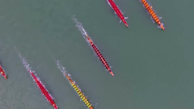 Chinese people rowing dragon boats