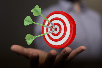 arrow hitting in the target center of dartboard on bullseye.