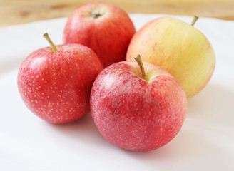 Red apples on white background