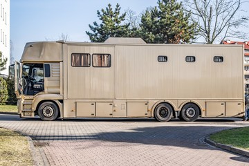 The vehicle for horses. Car for carrying horses. transportation livestock.