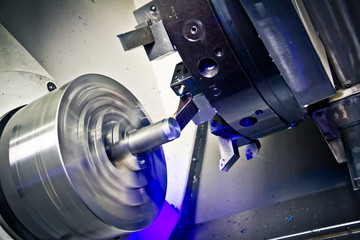 Fototapeta premium Cnc industrial lathe turning machine