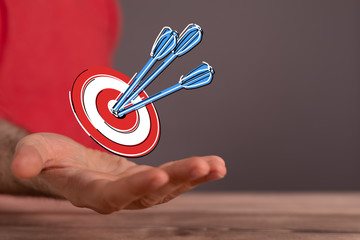 Dart arrow on target dartboard, Business success concept..