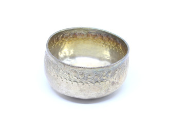 Old small silver bowl handicrafts of Thailand on a white background.