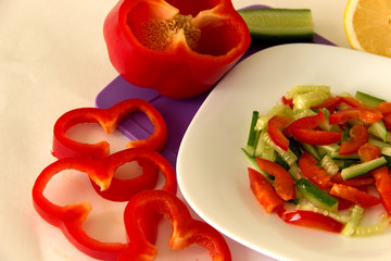 Healthy vegetable salad of pepper and cucumber.