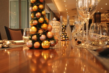 christmas table with candles and glasses 