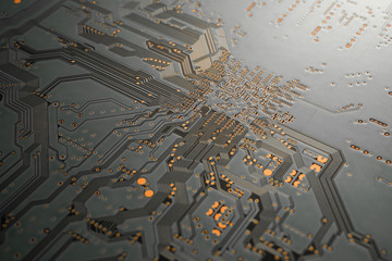 A close-up of black blank Printed circuit board (PCB) with no component mounted (copper exposed)