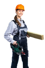 Girl builder with wood planks in their hands and circular saw. isolated