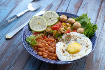 keto diet concept with egg and vegetable on plate 