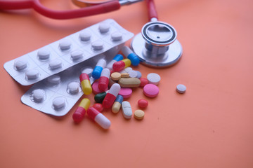 Close up of pills, capsule and stethoscope 