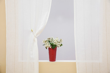 Fototapeta premium Curtain on window with home decoration. Interior design.