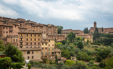 a view of typical brown houses in Siena city, Tuscany, Italy